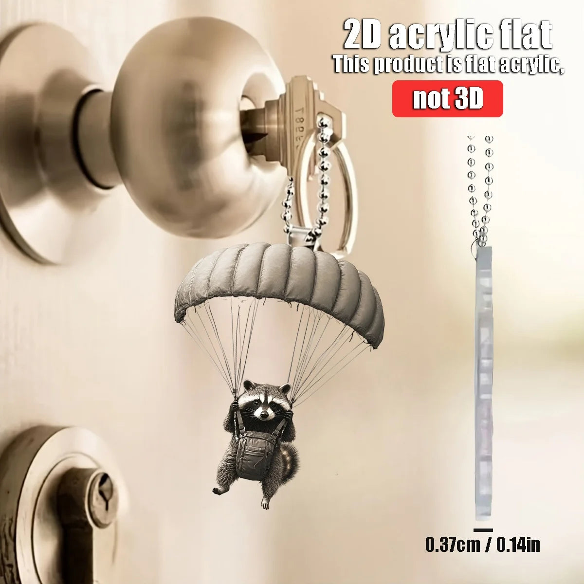 Parachute animal keychain pendant hanging from chain with small backpack detail