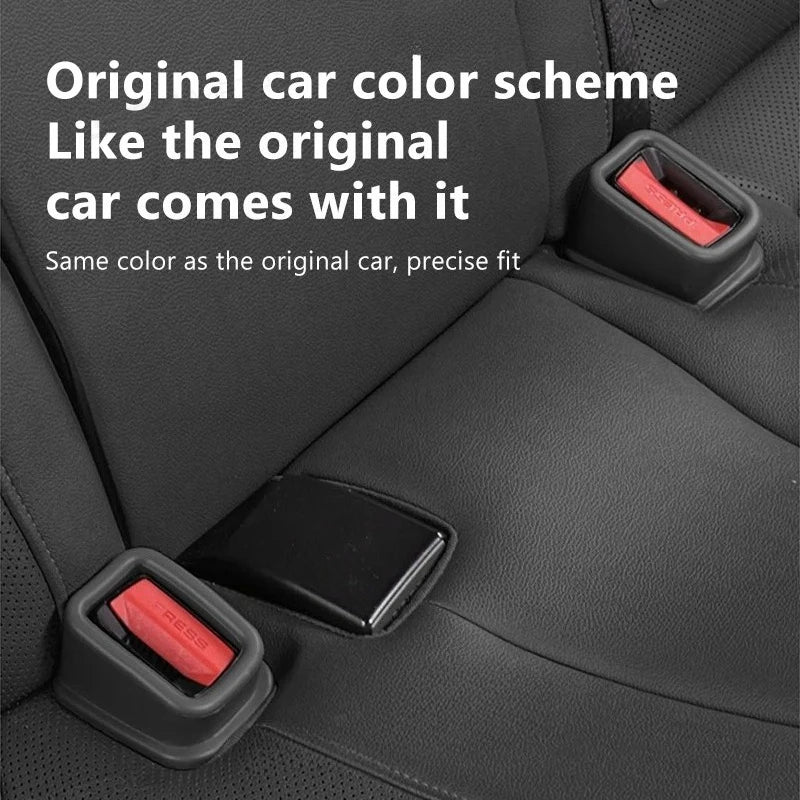 Black seat belt buckle protective cover set (2 pcs) on dark car seat