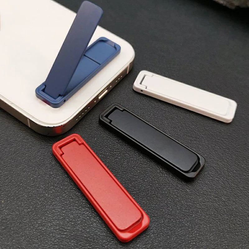 Ultra-thin folding phone bracket with adhesive back, blue, black, red, and white shown