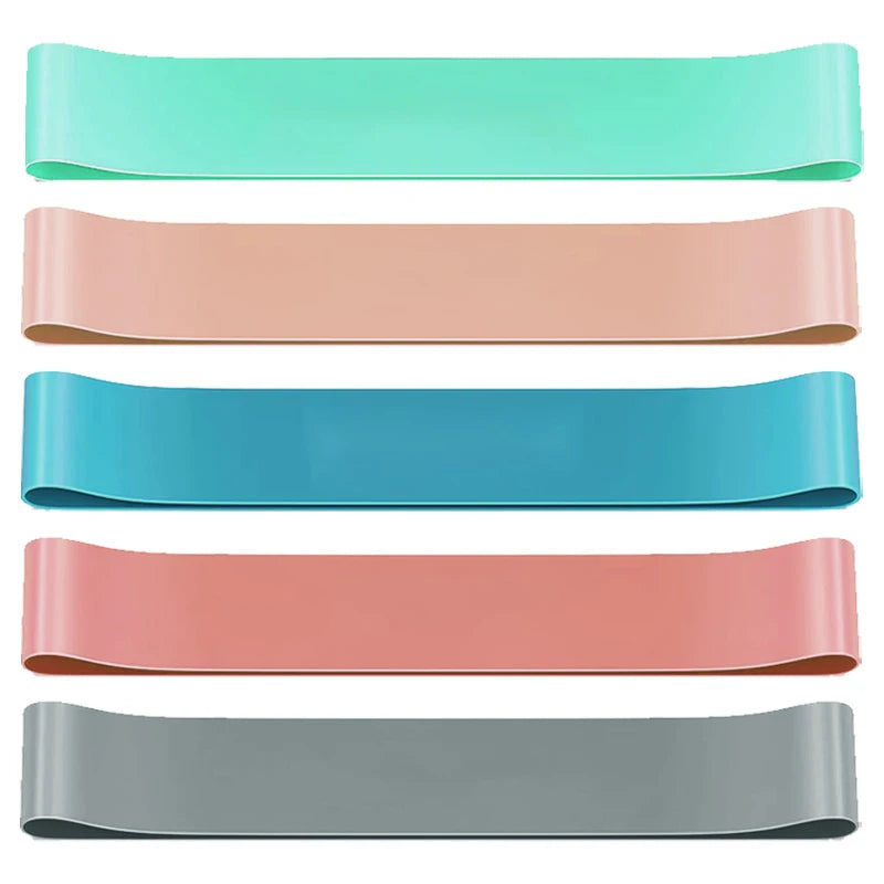 Resistance band set with mint, blush pink, teal, and gray loop bands