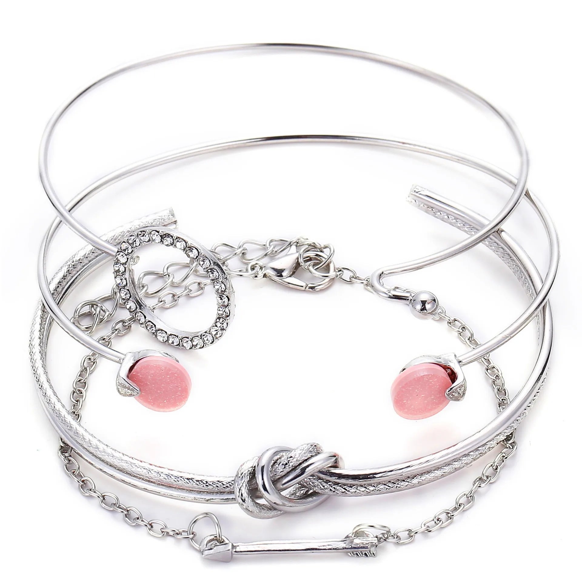 Silver chain bracelet set with pink heart charm drops and twisted knot link detail