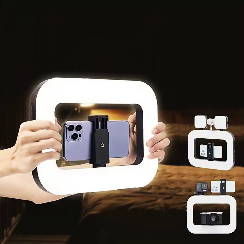 Handheld ring LED fill light with white frame, phone mount and center clamp