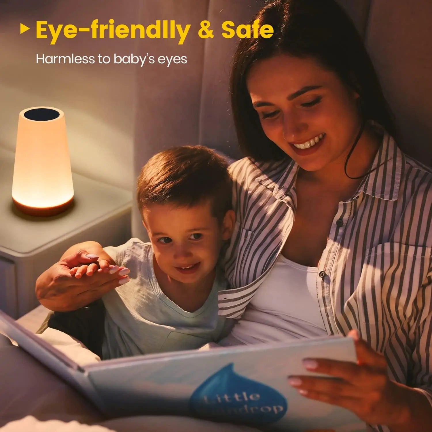 Portable touch night light on bedside surface with gentle warm glow.