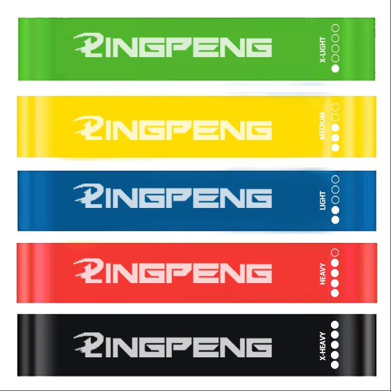 Set of five resistance yoga loop bands in green, yellow, blue, red, and black
