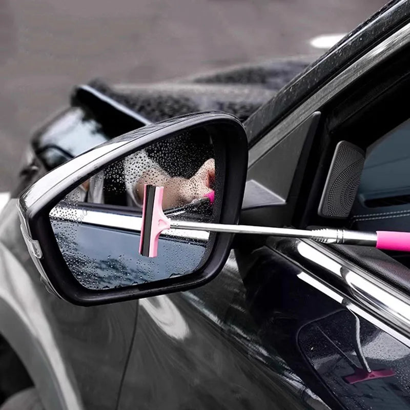 Car side mirror wiper cleaning tool with pink blade and silver telescopic shaft