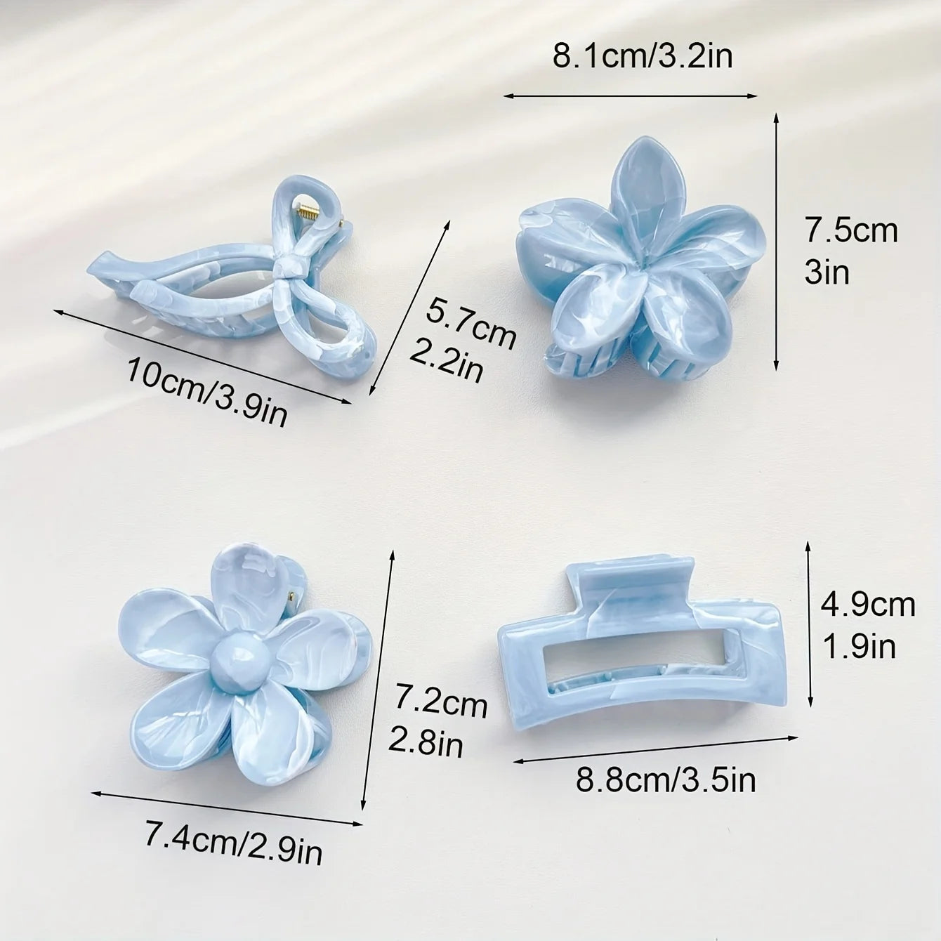 Light blue hair clip set with daisy flower, bow clip, and rectangular claw clip