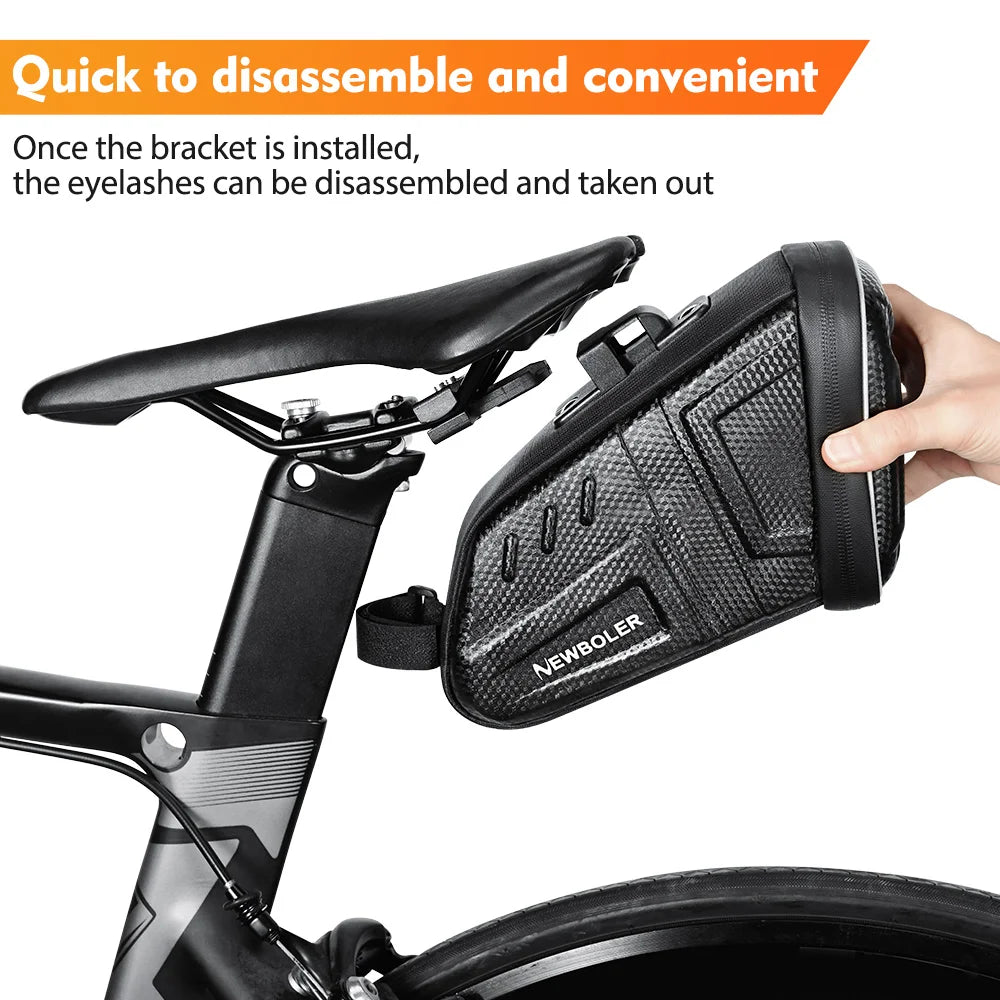 Black bicycle saddle bag being removed from quick-release bracket for easy disassembly