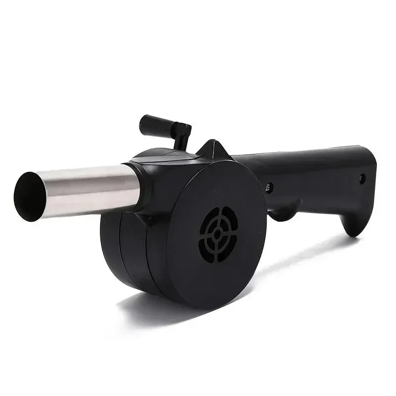 Manual hand-crank air blower with black fan housing, silver air outlet tube, front fan grille