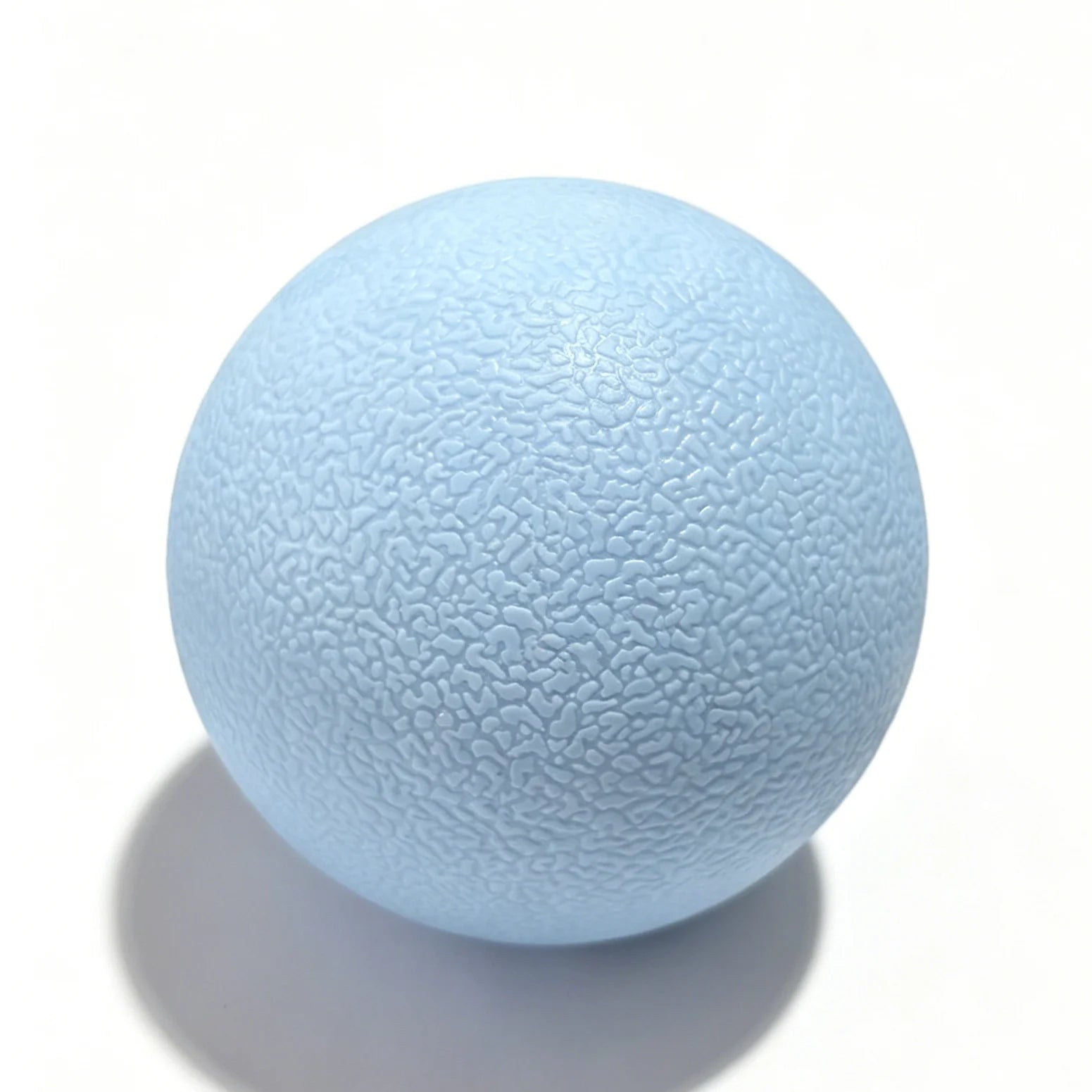 Light blue bumpy massage ball for fascia and muscle relaxation