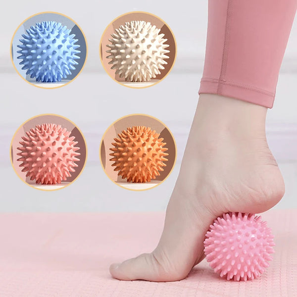 Pink spiked massage fascia ball for foot pressure and muscle relaxation