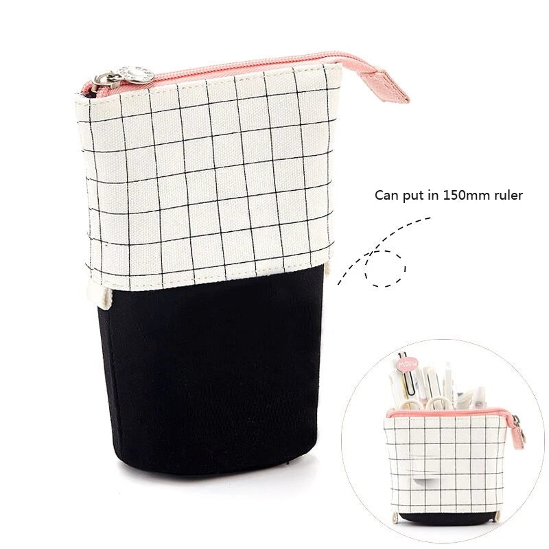 Two-tone grid canvas pencil pouch with zipper, white grid top and black bottom.