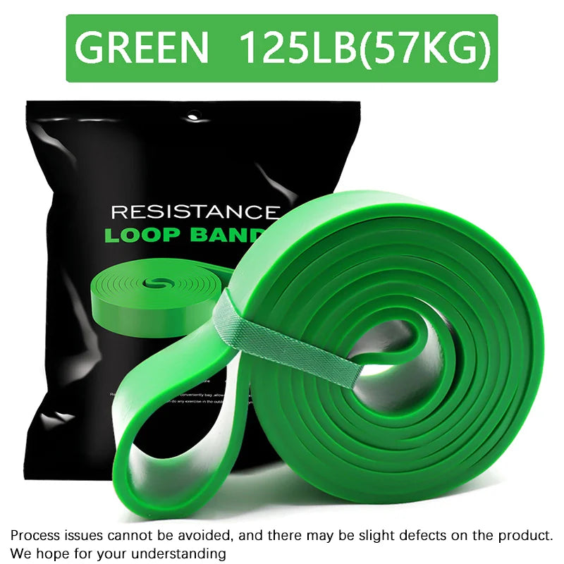Green resistance loop band coil for strength training and mobility exercises