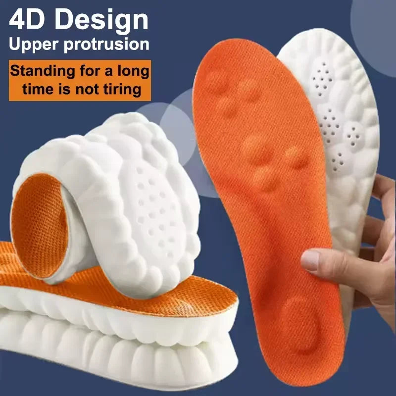 Shock-absorbing running shoe insoles in orange and white, with textured cushioning top