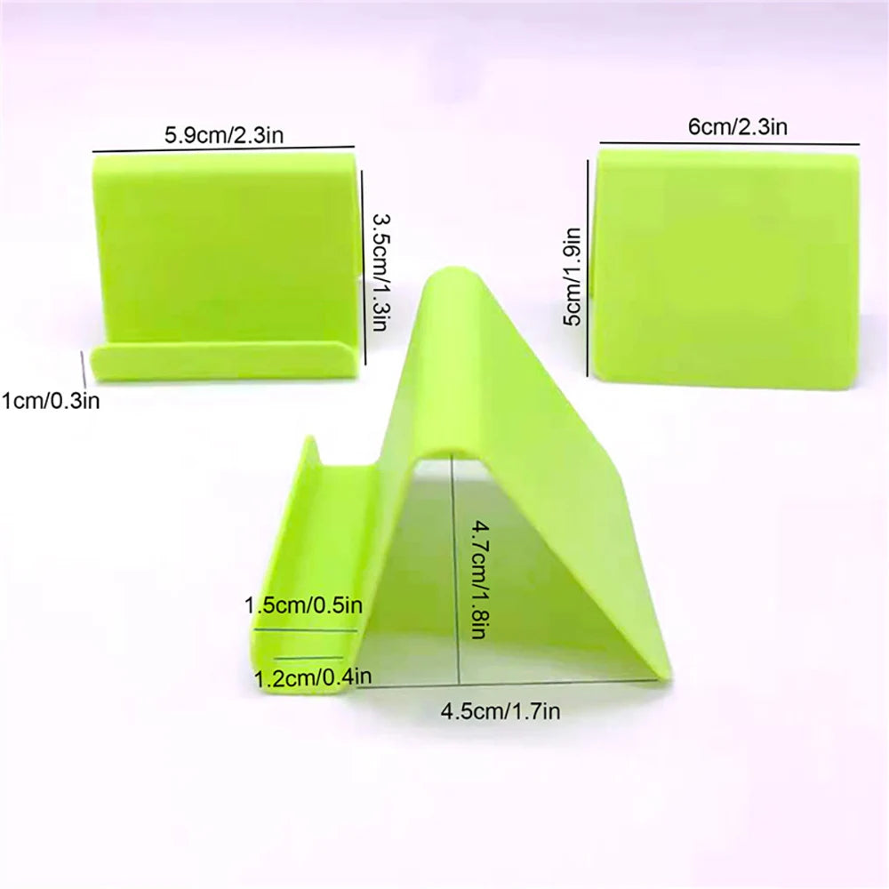 Lime green plastic phone holder stand, foldable V-shape for desk viewing