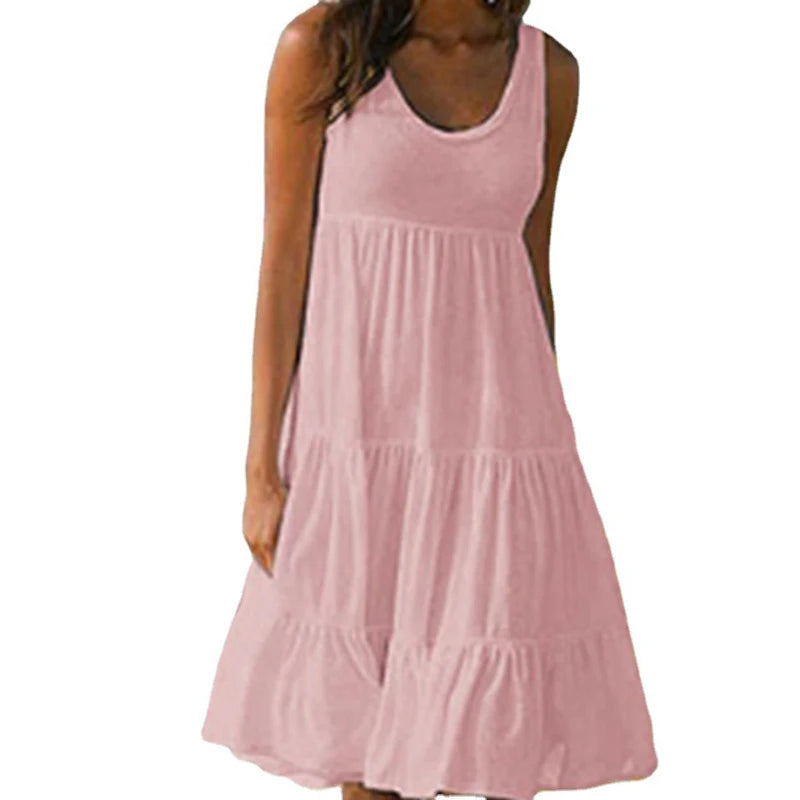 Light pink sleeveless mini dress with scoop neck and tiered ruffle skirt