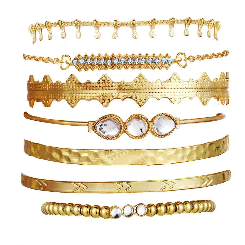 Gold-tone geometric charm bracelet set with chunky chain and open bangles