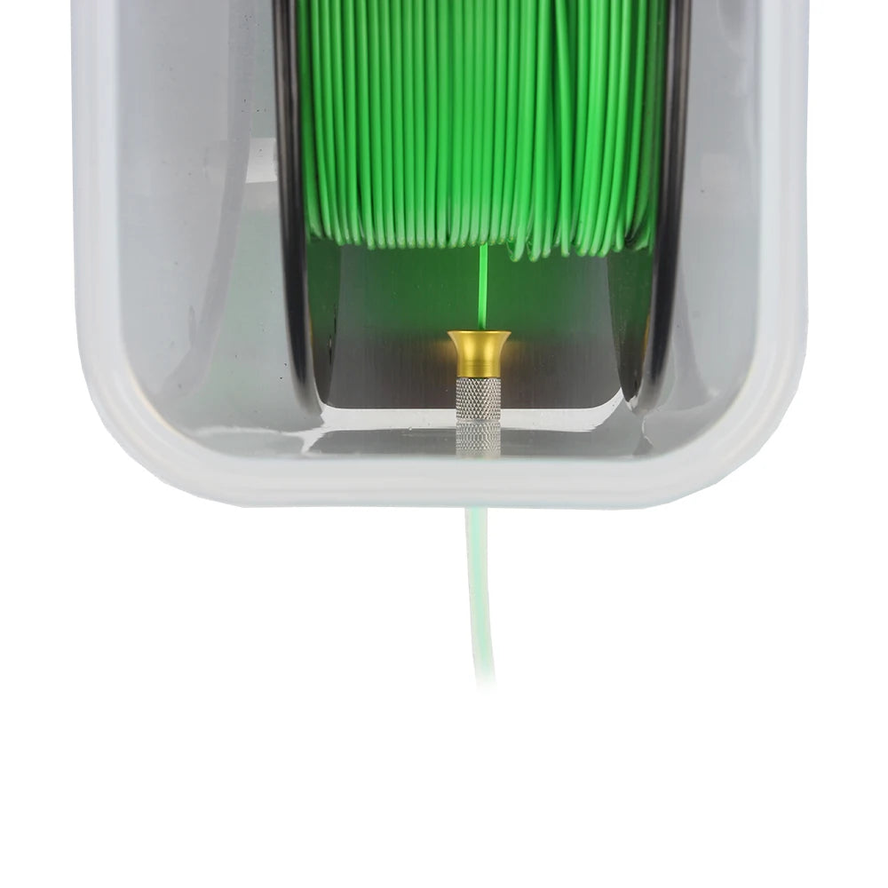3D printer filament dryer box with green filament inside and tube connection opening