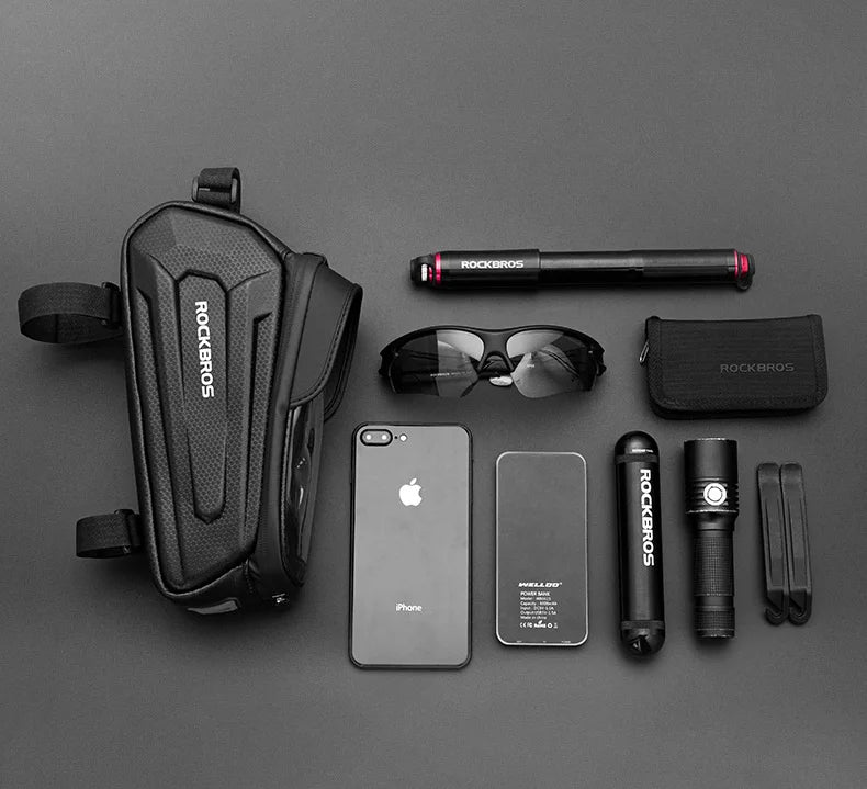 ROCKBROS bike frame phone bag and accessories laid out, black carbon-texture design