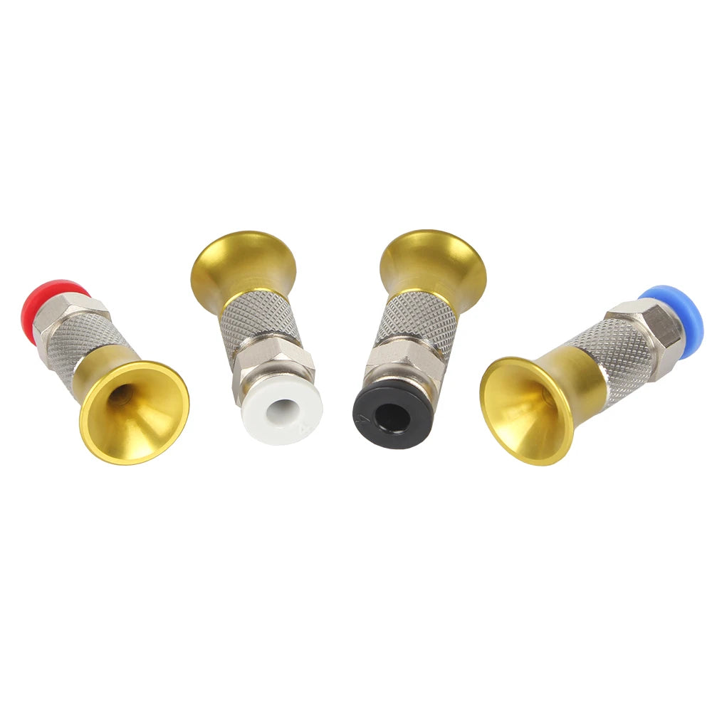 Gold pneumatic connector set with colored top seals, angled view of 4 couplers
