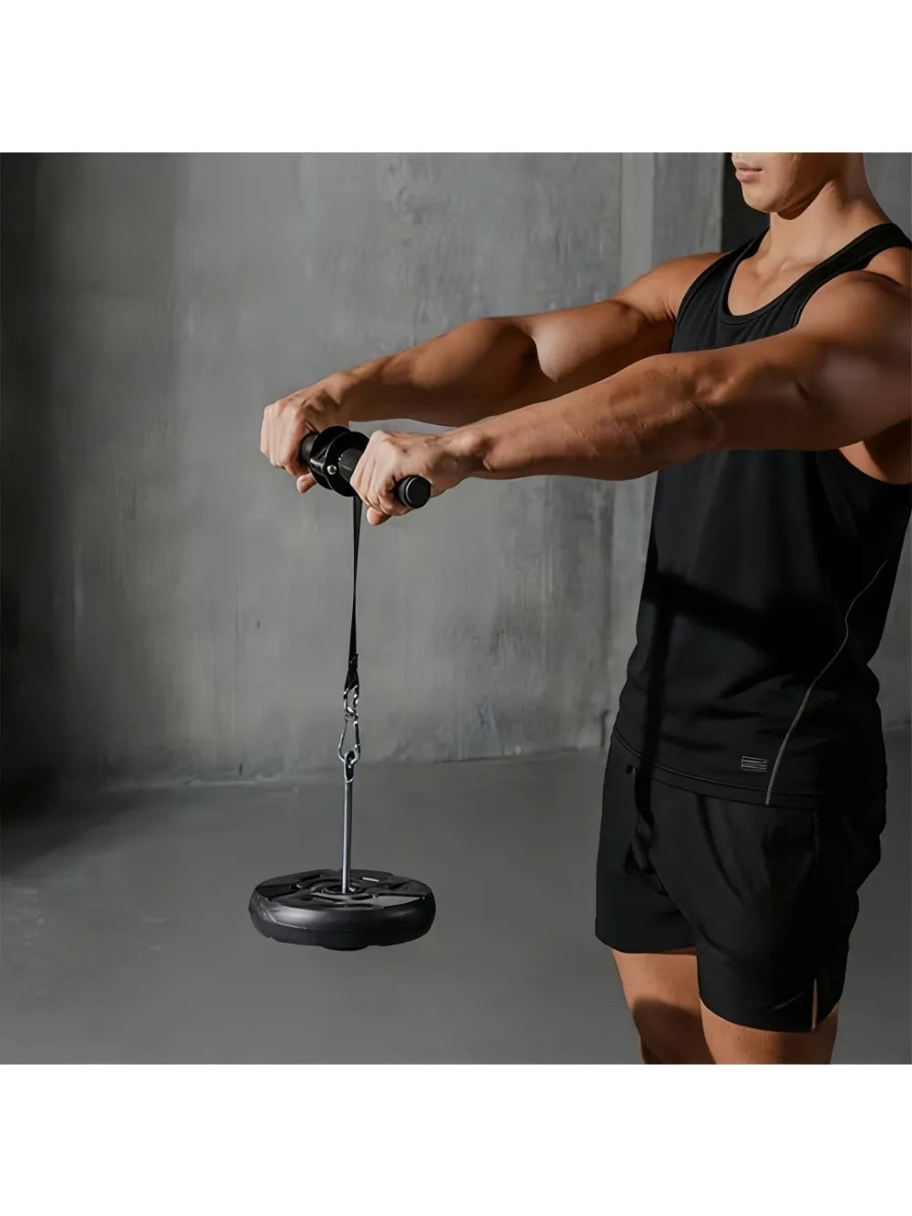 Forearm and wrist strength trainer in use with black handle and hanging weight plate