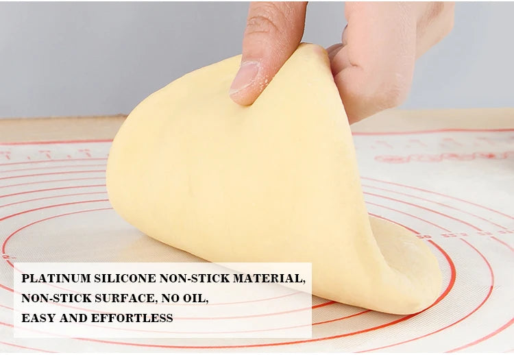 Silicone non-stick dough mat with red spiral lines and hand shaping dough