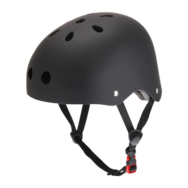 Kids bike helmet, matte black with ventilation holes and chin strap.