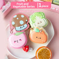 Fruit and vegetable mini memo pad set with cute faces on a white plate