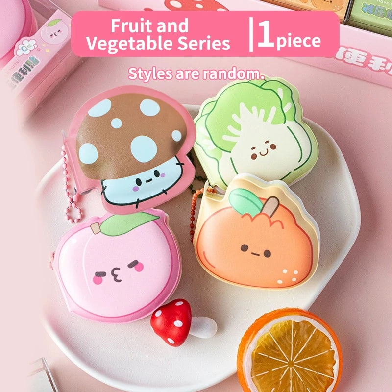 Fruit and vegetable mini memo pad set with cute faces on a white plate