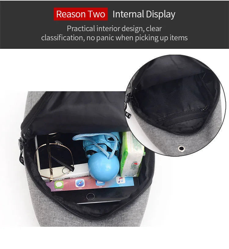 Gray fanny pack open inside, showing compartments with phone and small accessories