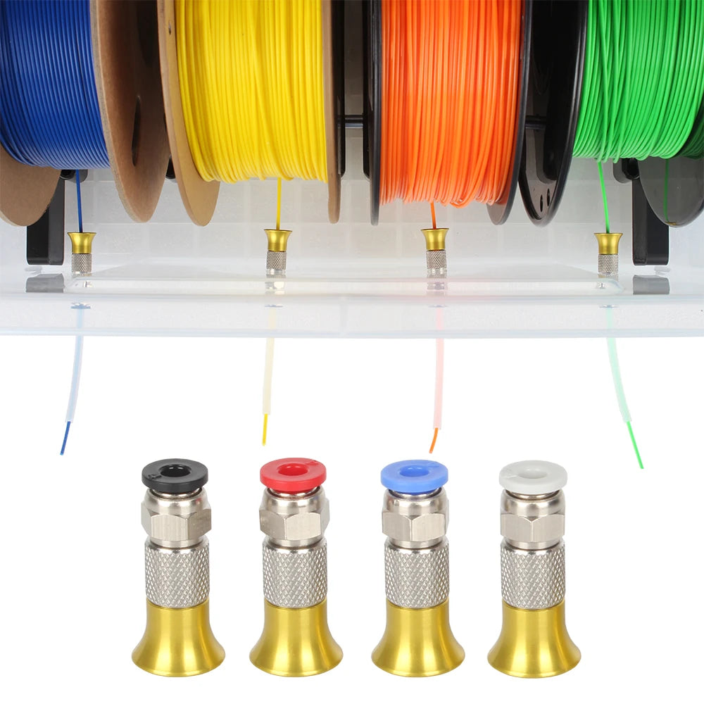 Four pneumatic connectors with colored top caps beneath multicolor filament spools