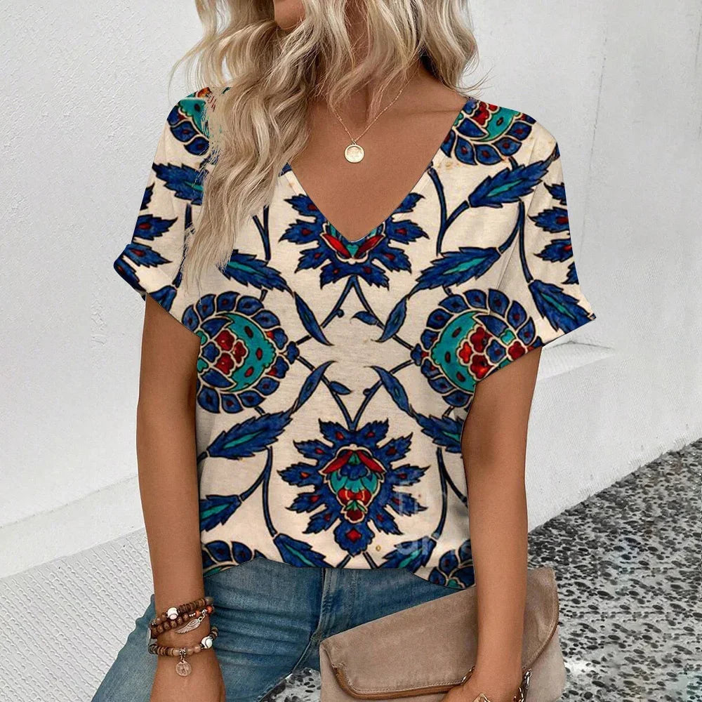 Women's plus-size V-neck T-shirt, cream with blue floral and butterfly print.
