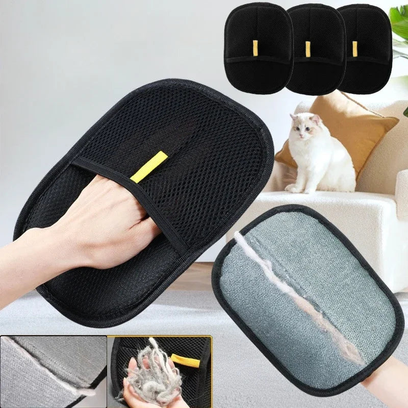 Double-sided pet grooming mitt with black mesh outer and gray brush side, yellow tab