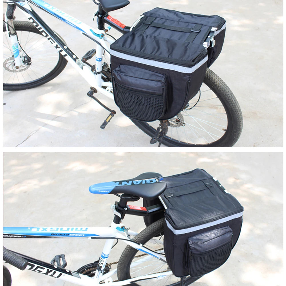 Black bicycle rear seat double pannier bag mounted on a bike frame, top cover closed
