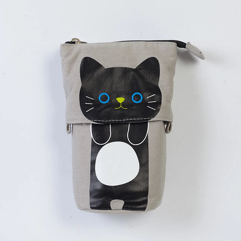 Gray cat-face pencil case pouch with zipper, black printed features and blue eyes