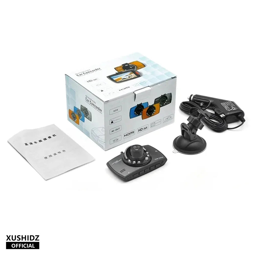 Dash camera kit with recorder, suction mount, cables, and user manual papers