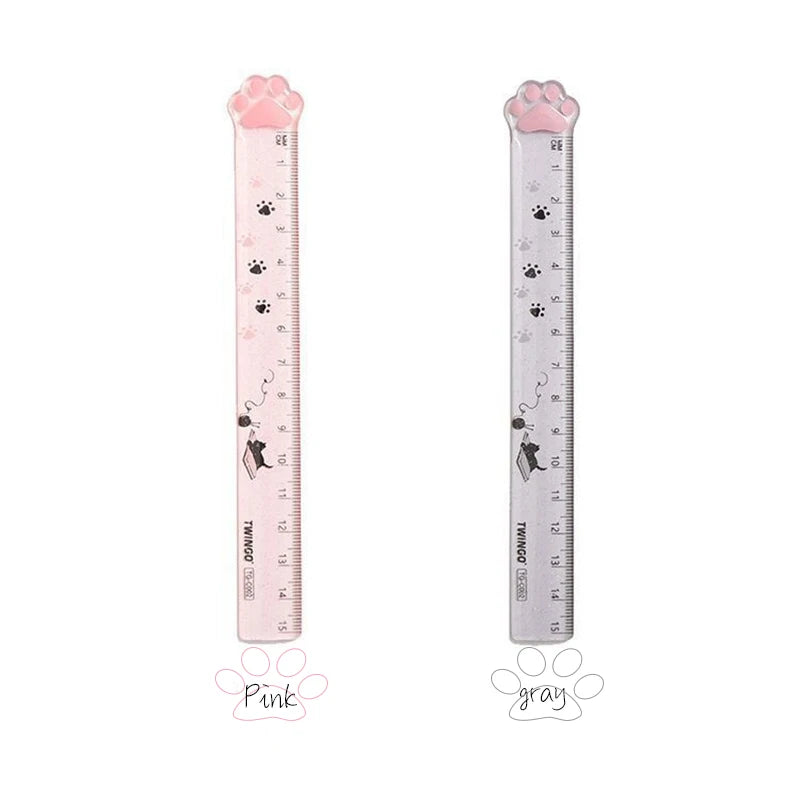 Two cat paw plastic straight rulers, pink and gray, each with paw-shaped top ends