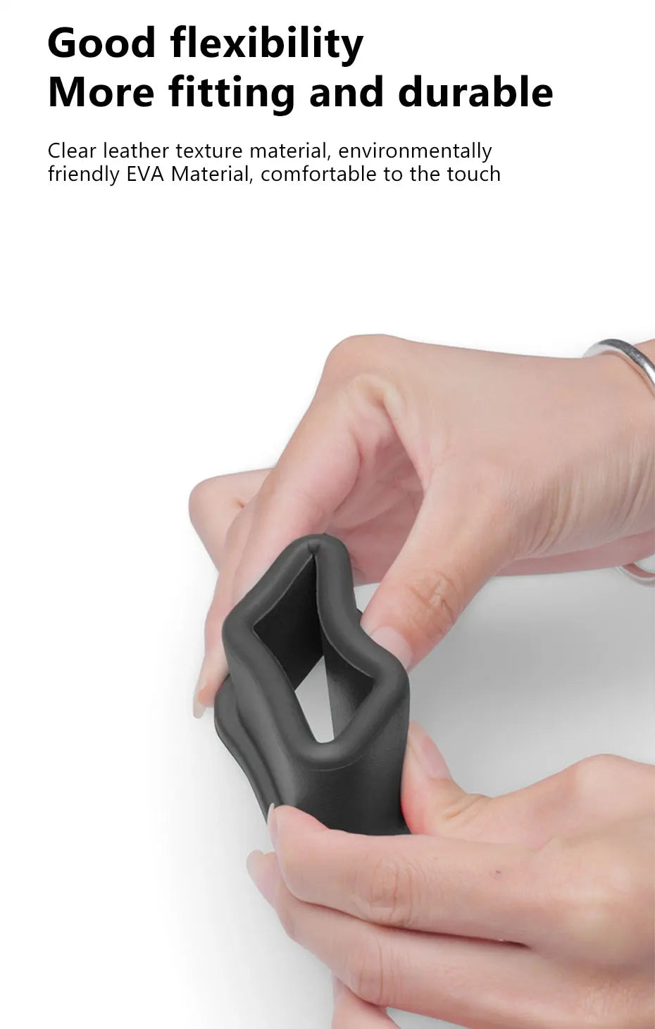 Dark gray seat belt buckle cover held by hand, open cradle design