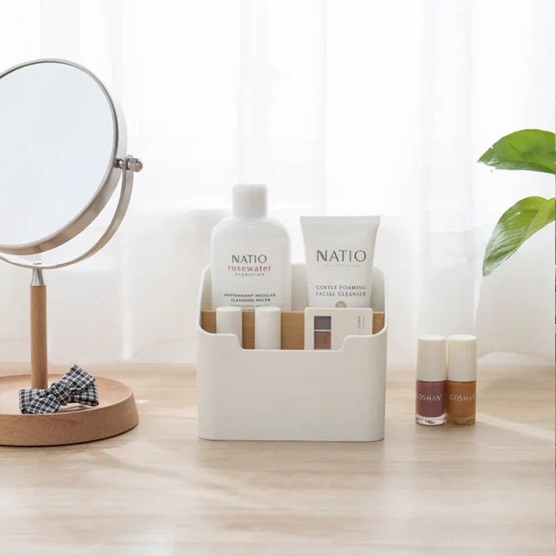 White plastic storage box holding skincare bottles and small cosmetic containers