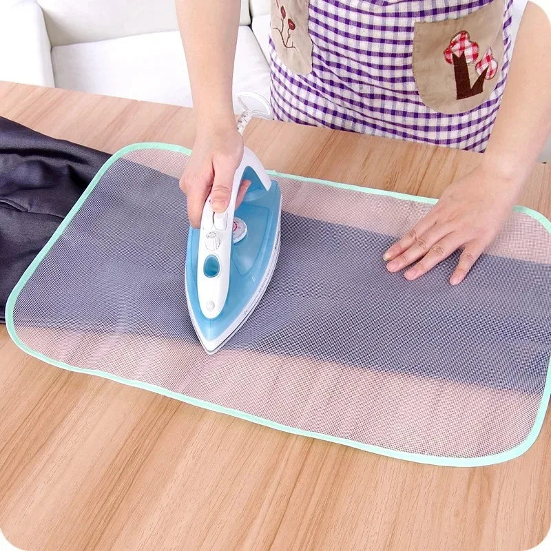 Protective ironing board mat cover, gray mesh with teal edge trim and mini iron