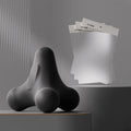 Black fascia massage ball with three white accessory cards in display set