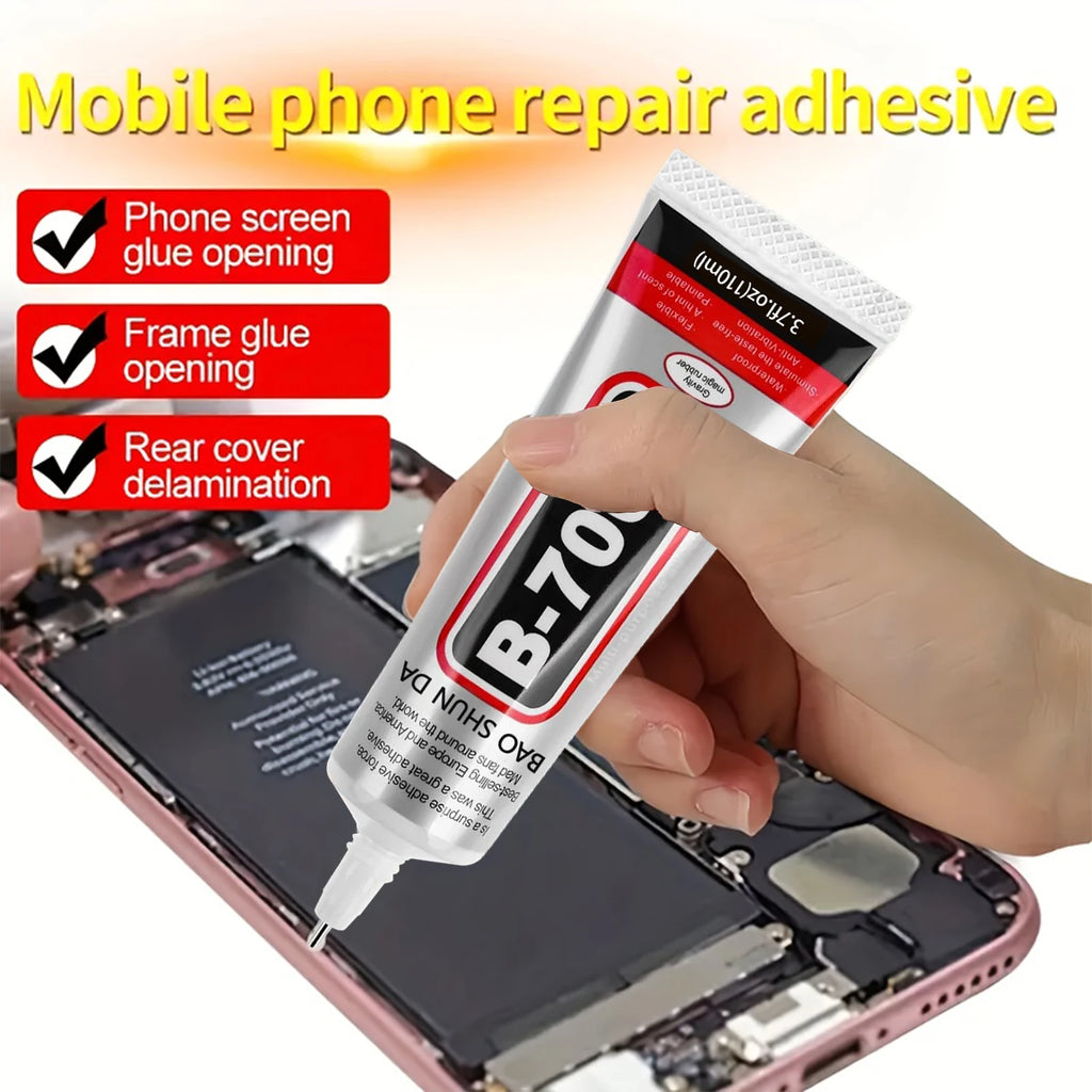 Phone screen repair adhesive tube (B7000) in hand with open smartphone parts
