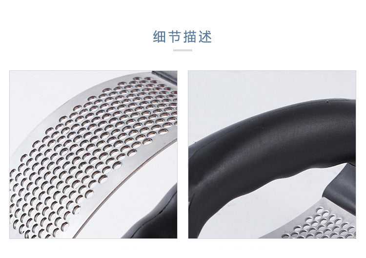 Stainless steel garlic press close-up of perforated plate and black handle