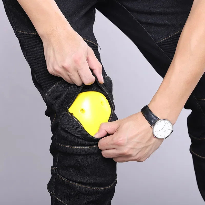 Black riding jeans with open knee armor pocket and yellow protective pad