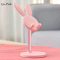 Pink rabbit phone stand with bunny ears, round mesh top, and flat circular base