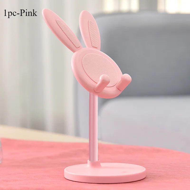 Pink rabbit phone stand with bunny ears, round mesh top, and flat circular base
