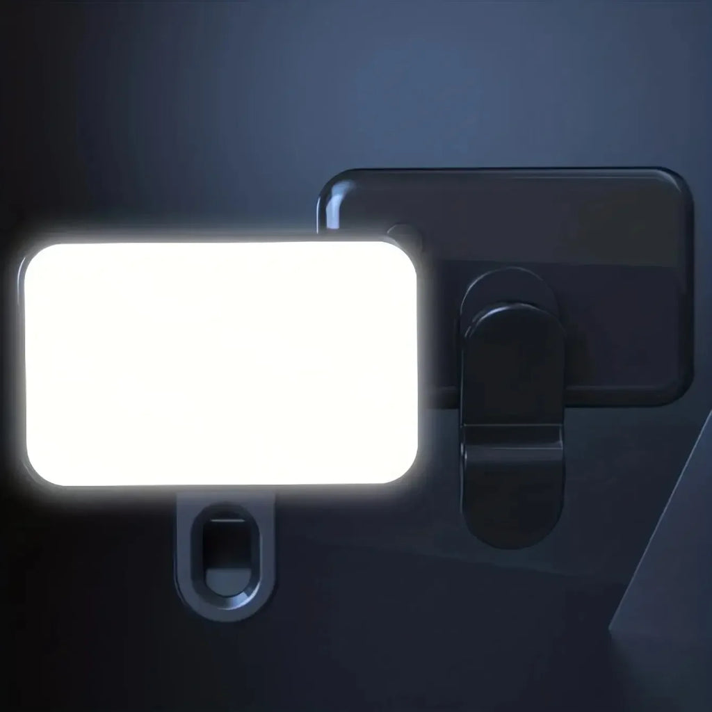 Black clip-on mini LED fill light with bright rectangular panel