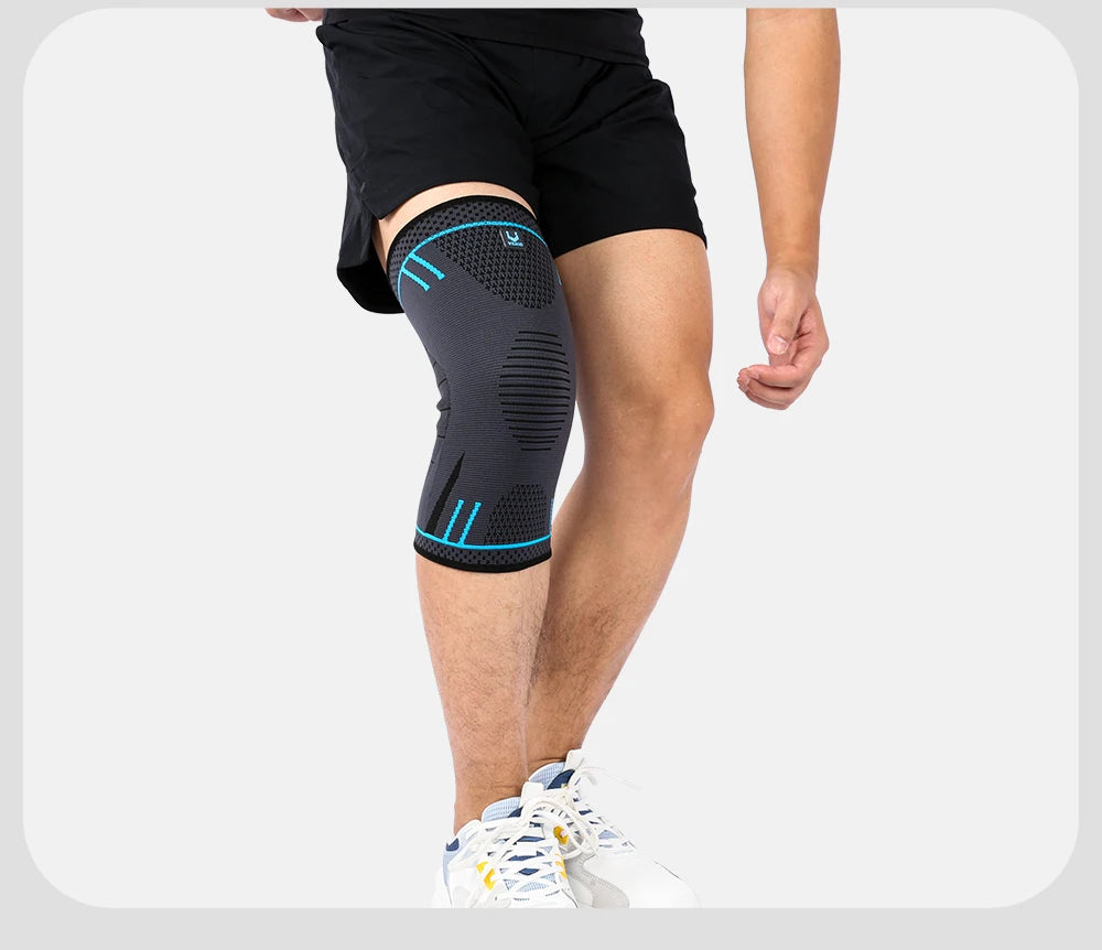 Black knee compression sleeve with blue stripes worn on a runner's leg