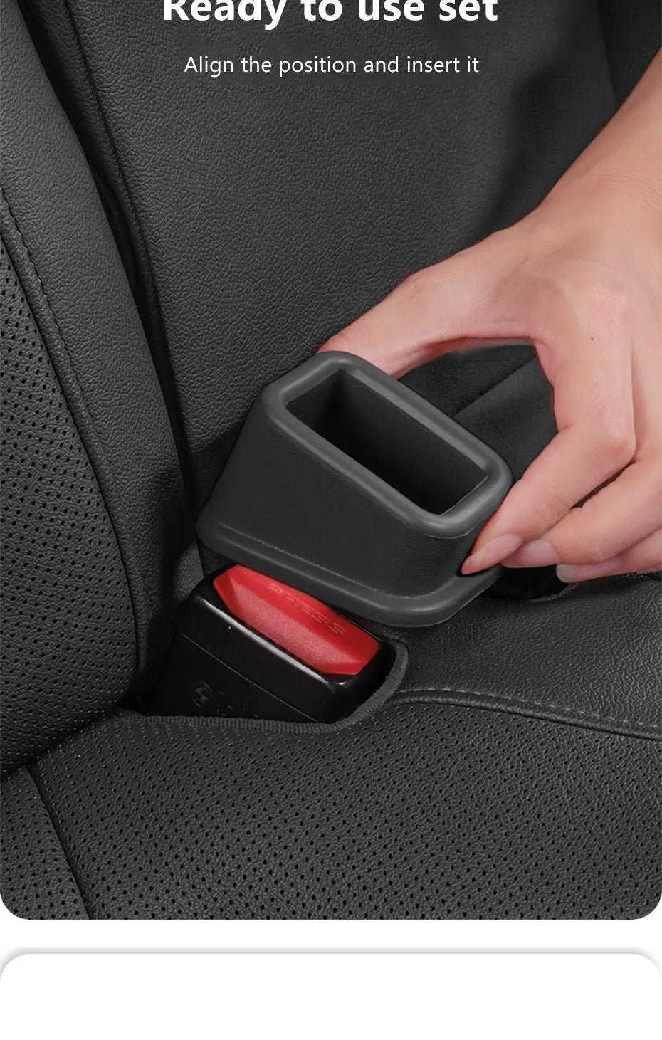Hand installing a dark gray seat belt buckle protective cover on car seat