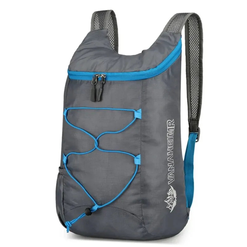 Gray folding backpack with blue trim, front bungee organizer and mesh back straps