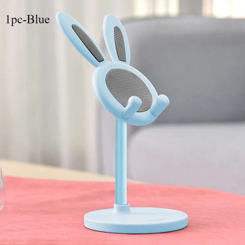 Light blue rabbit-shaped desktop phone stand with textured holder and round base